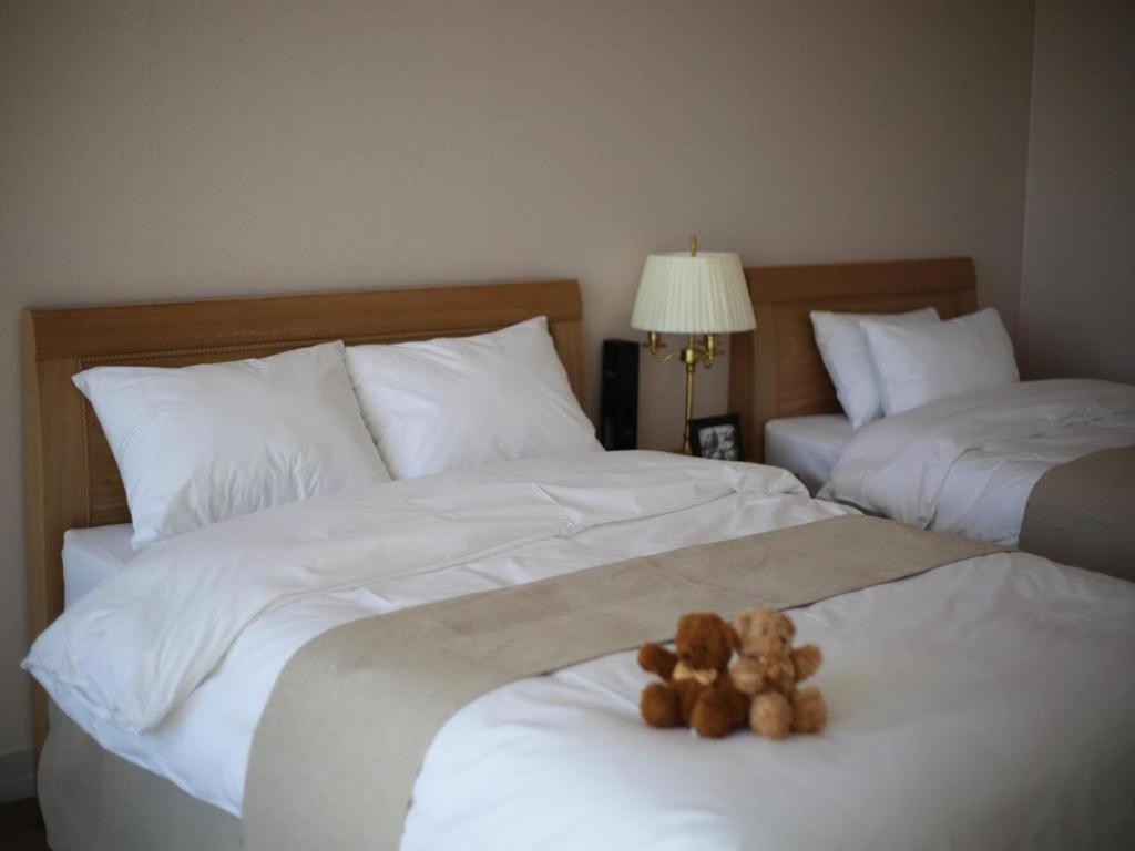 Hotel Aroha Jeju Seogwipo Bagian luar foto